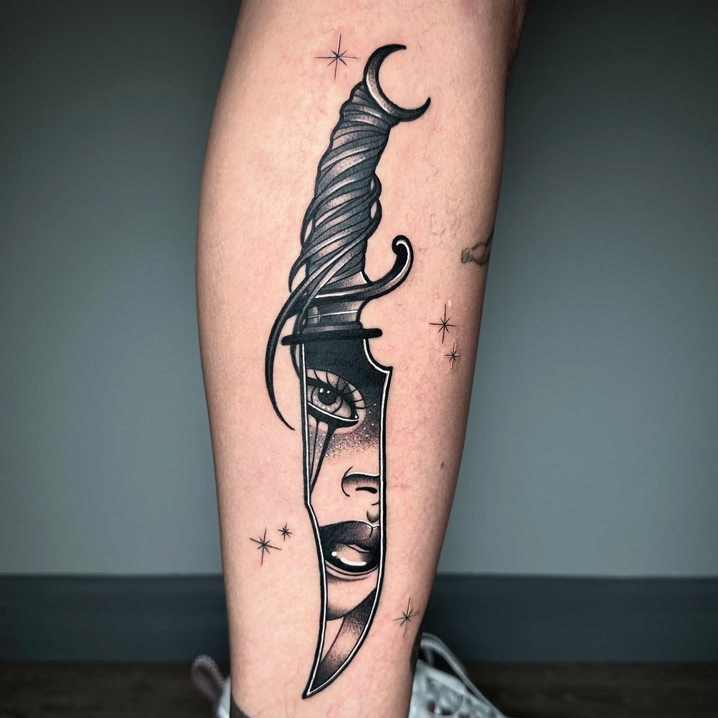 Dagger tattoo with a female face — Luke